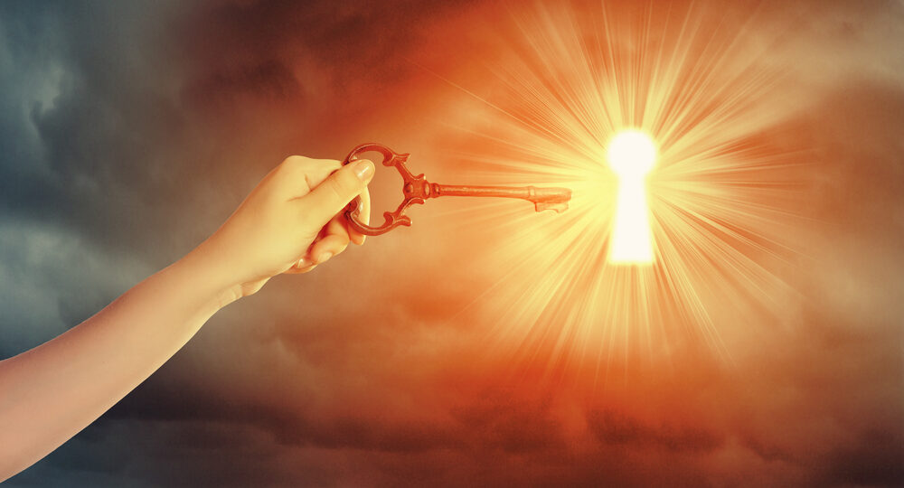 Close,Up,Image,Of,Human,Hand,Inserting,Key,In,Key