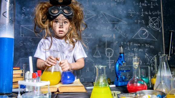 Funny,Little,Girl,Doing,Experiments,In,The,Laboratory.,Explosion,In
