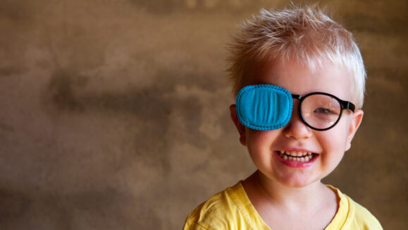 Portrait,Of,Funny,Child,In,New,Glasses,With,Patch,For